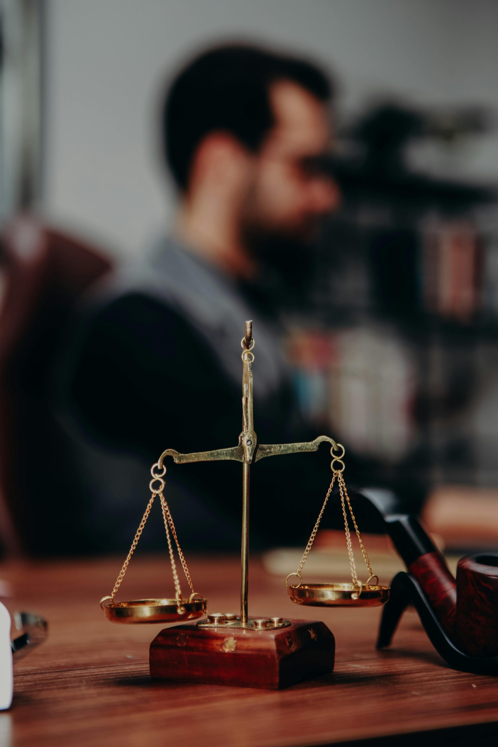 Scales of justice symbolizing fairness in cases where a debt collector sues