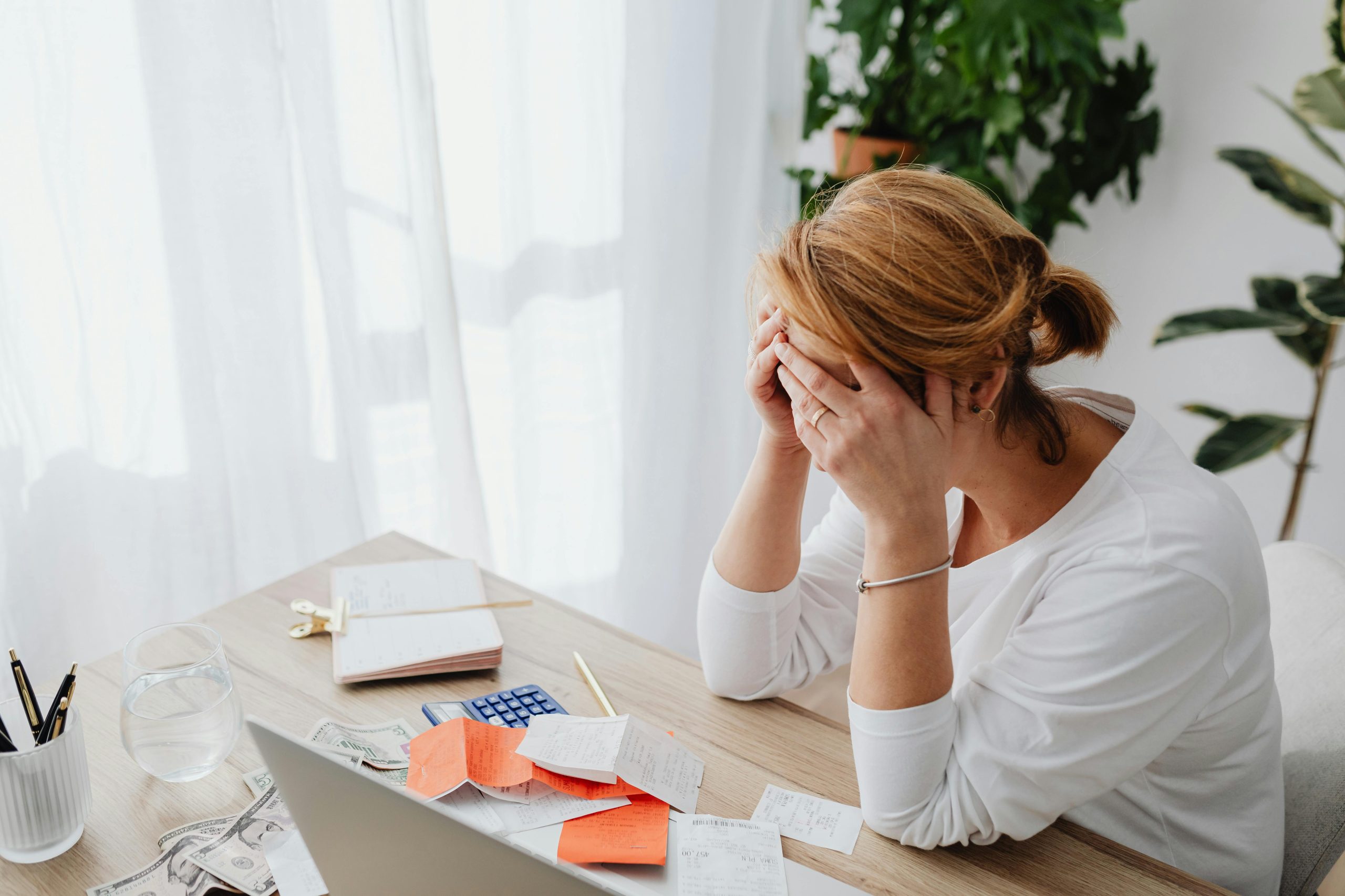 A person experiencing debt fraud.